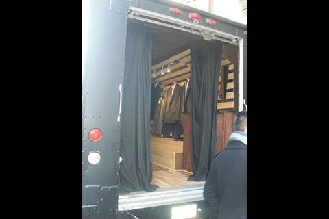 Arden Reed is using a 3D scanner, housed in its mobile shop, to get more accurate suit measurements